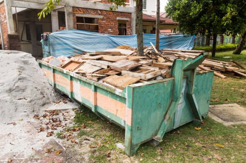 Enclosed and lockable skip on a construction site in Stratford