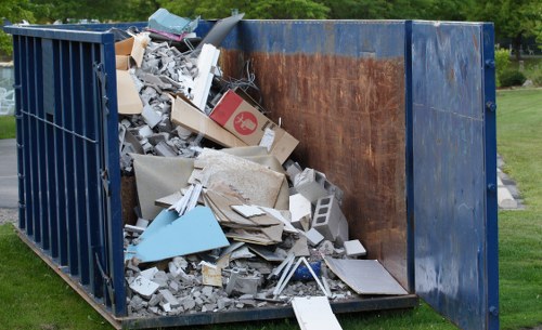 Demolition site with workers removing debris
